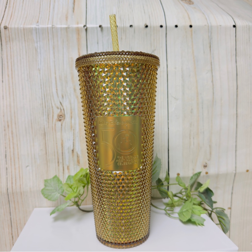 Disney Gold Starbucks 50th Anniversary tumbler with straw